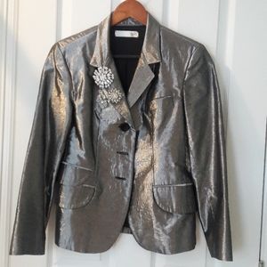 Metallic jacket with rhinestone pins